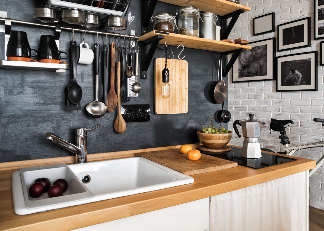 Urban and modern kitchen design with ingridients and utensils.