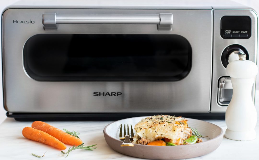 Shepards pie next to a Sharp Supersteam Countertop Oven.