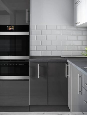 An image of the 30 in. Smart Convection Wall Oven with Microwave Drawer Oven in a model kitchen.
