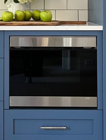 Sharp SMD2499FS in a modern kitchen with blue cabinets