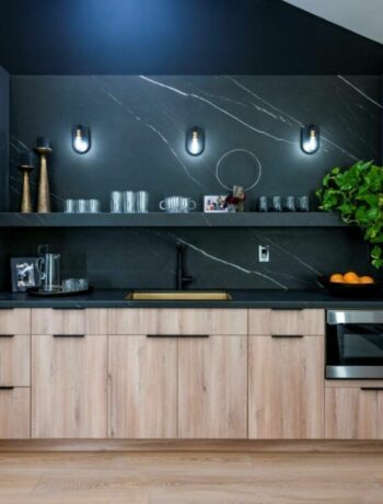 A modern kitchen with black features from Celebrity IOU with Idina Menzel.