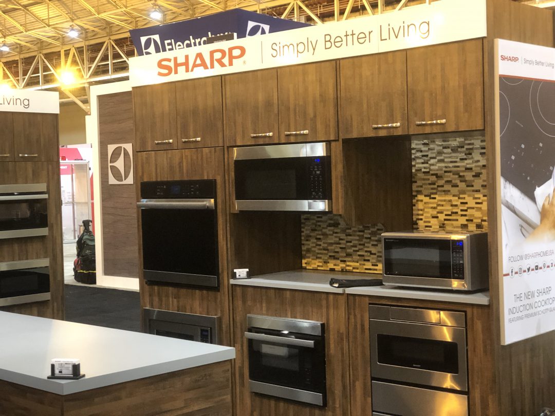 Sharp display booth at a trade show.
