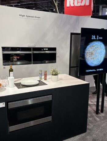 An image of Sharp's cES 2024 booth including the Sharp low-noise stick vacuum and hair dryer prototypes to the high-speed oven featuring proprietary Quad Heating Technologies