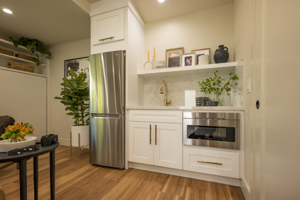 A stylish small kitchen with microwave drawer oven.