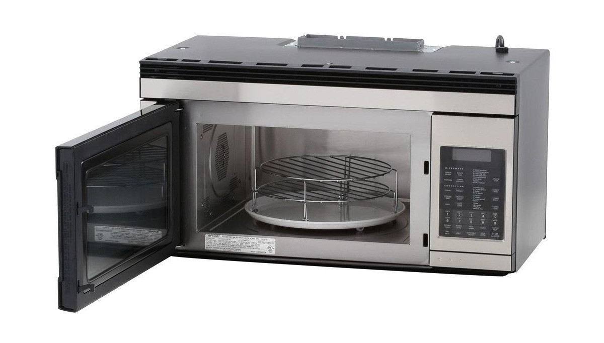 1.1 cu. ft. 850W Sharp Stainless Steel Over-the-Range Convection Microwave (R1874TY) – left angle view with door open