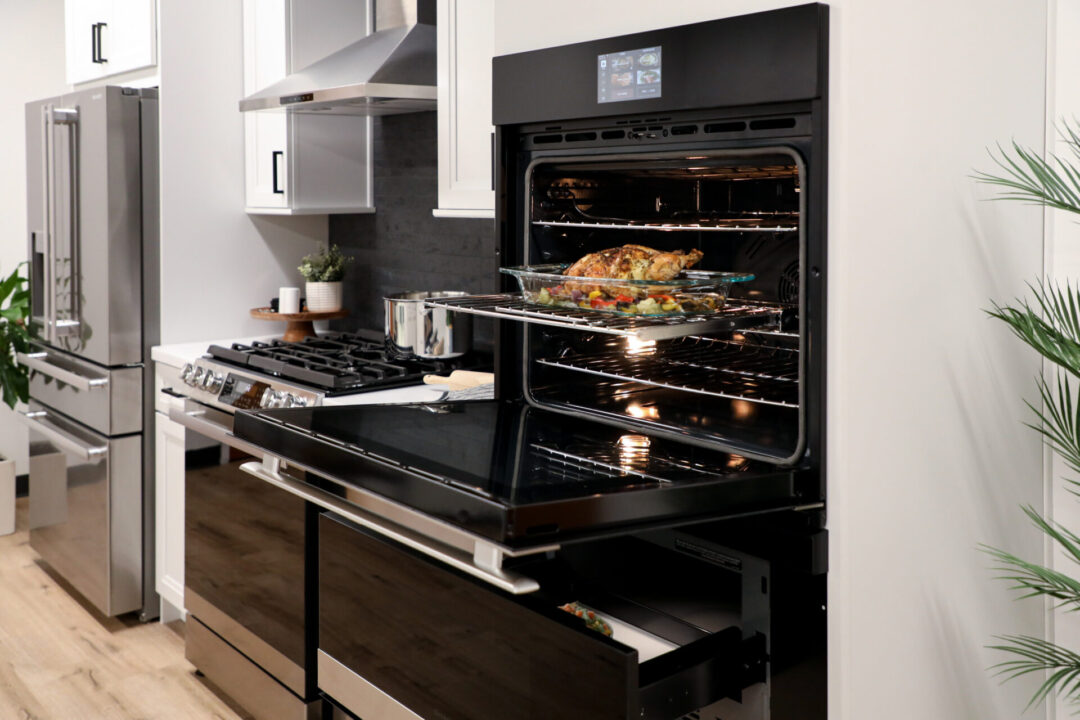 The Sharp Smart Combi Wall Oven with Microwave Drawer Oven (SWB3085HS) cooking meat