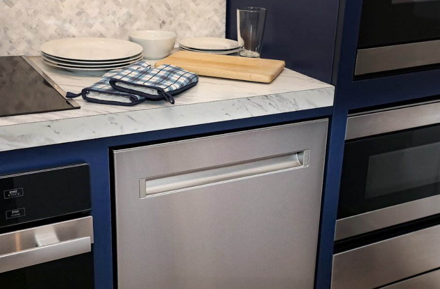 The Sharp 24 in. Slide-In Smart Dishwasher (SDW6767HS) in a kitchen.