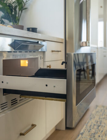 open microwave drawer in kitchen lifestyle image