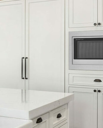 Sharp Microwave with trim kit in kitchen cabinets