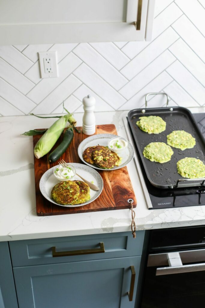 Sunkissed Kitchen's Zucchini and Corn Fritters recipe.