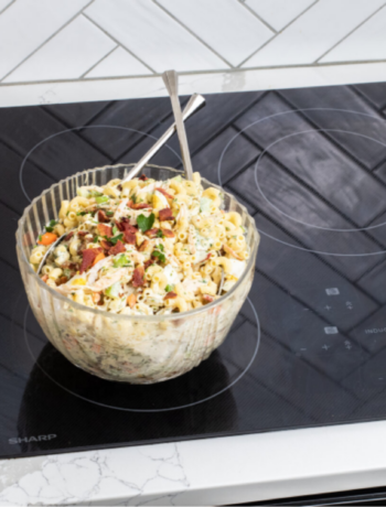 image of a chicken macaroni salad dish on a stovetop