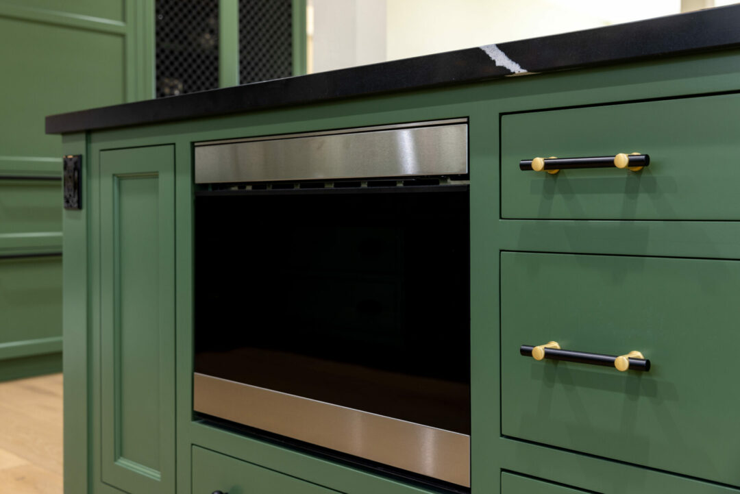 Sharp Microwave Drawer Oven on Celebrity IOU with Emma Roberts in a green modern kitchen
