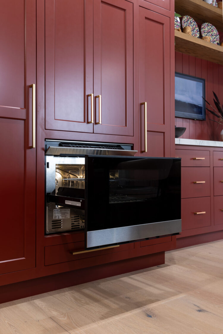 Sharp Microwave drawer oven open in red kitchen