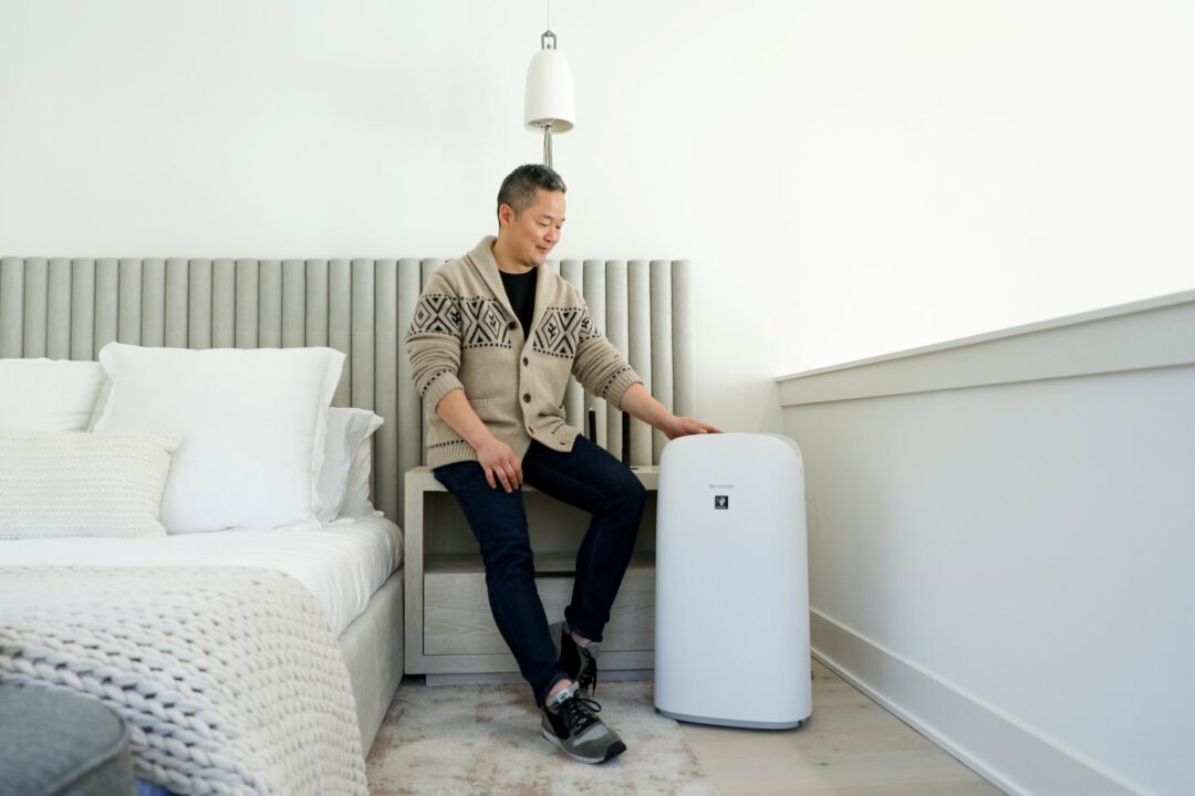 Danny Seo in the Serenbe House with an air purifier