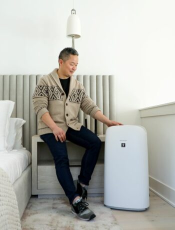 Danny Seo in the Serenbe House with an air purifier
