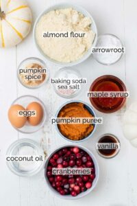 ingredients for pumpkin cranberry coffee cake on a white background