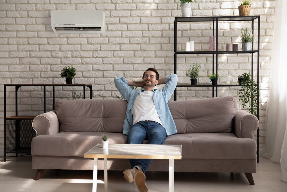 Man sitting on couch in man cave