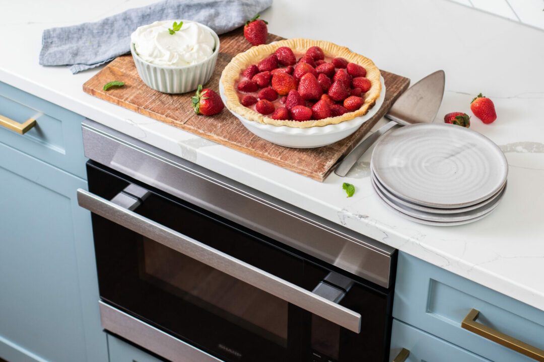 Strawberry pie on a cutting board