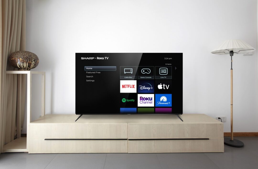 A model living room with the Sharp Roku TV OLED 4K UHD with HDR10.